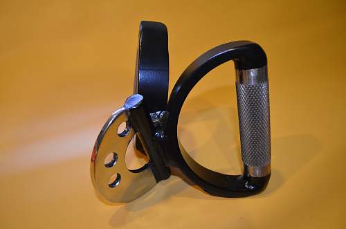 goggles gray and black hand tool on brown surface bronx
